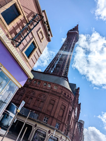 Blackpool Tower is a very famous landmark, here seen from the base of it as it towers over the skies for all to see.の写真素材
