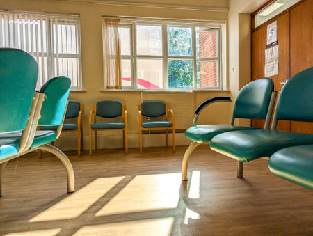 Patients and visitors often first have to start at a Hospital Waiting room to be seen by a Nurse or Doctor, which can often be a very long wait with minimal facilities.の写真素材