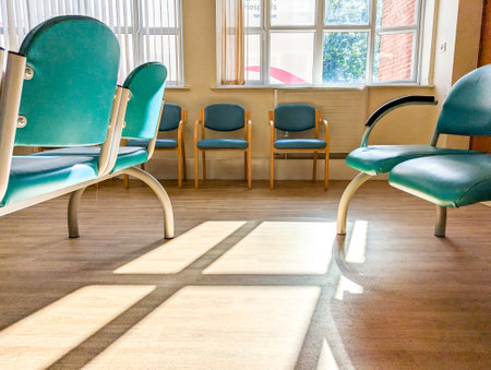 Patients and visitors often first have to start at a Hospital Waiting room to be seen by a Nurse or Doctor, which can often be a very long wait with minimal facilities.の写真素材