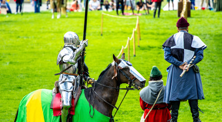 A jousting event held in the grounds of a castle to bring enjoyment to various aged spectators from all around.の写真素材