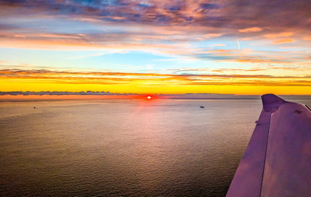 A view from above the English Channel where boats of all types pass through. Here seen with the sun setting creating beautiful colours.の写真素材