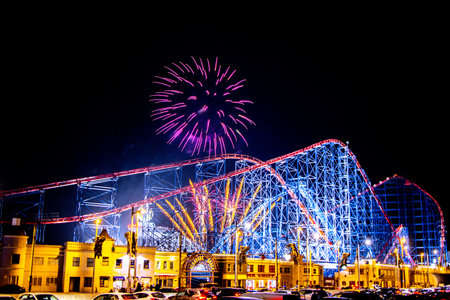Blackpool Pleasure Beach hosting a night fireworks display within the grounds of the Pleasure Beach rides location for all around to enjoy.の写真素材