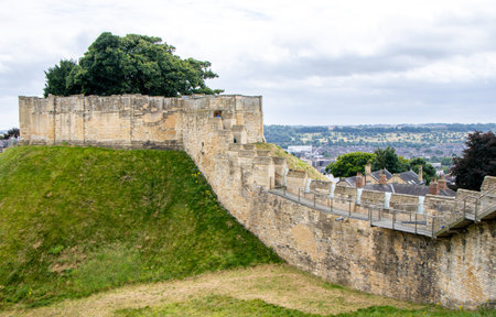 Lincoln Castle wall was once a defense from unwanted visitors, these days it's open to tourists and locals to walk around and enjoy the views from it.の写真素材