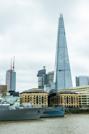 The Shard is a sharp skyscraper that stands tall over London, United Kingdom, visited by millions per year.の写真素材