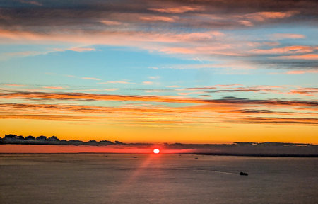 A view from above the English Channel where boats of all types pass through. Here seen with the sun setting creating beautiful colours.の写真素材