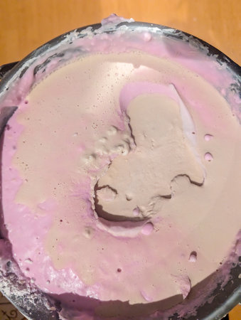 Hand casts made from alginate powder that has set to contain hand formations. Memories made from casting powder then poured into the pink casts.の写真素材