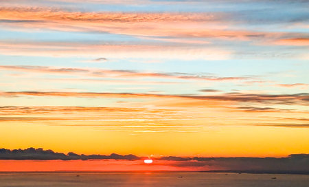 A view from above the English Channel where boats of all types pass through. Here seen with the sun setting creating beautiful colours.の写真素材