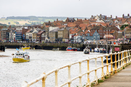 A sea wall designed, built and put in place to prevent stormy weather breaching the walls and damaging property inland.の写真素材