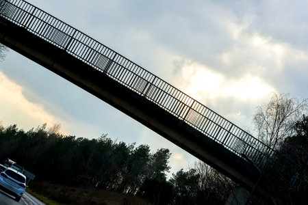 A bridge structure for people and vehicles to pass over or under. Bridges often an awe inspiring structure of engineering, new or old.の写真素材