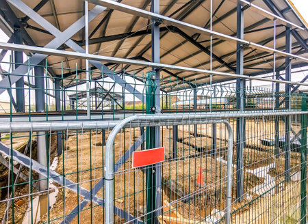 A steel structure being built up to produce a new building most likely for small businesses to move into.の写真素材