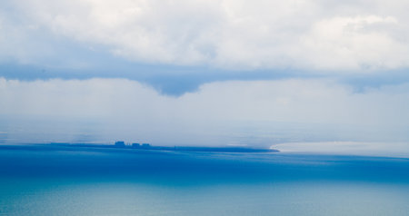 Bad Weather clouds seen from an aircraft approaching To Bring Heavy Rain And/Or Strong Winds. Typically dark or large clouds indicate heavy weather is inbound or passing by.の写真素材