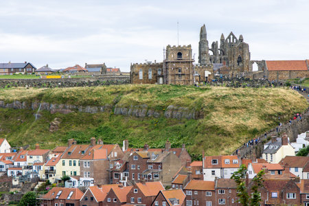 Whitby Abbey is a stunning piece of history that sits high above the town waiting for people from all over to visit and enjoy it's surroundings.の写真素材