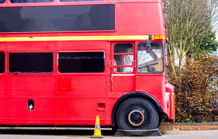 The iconic red double decker London transport bus seen converted into something other than public...