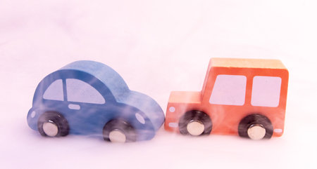 A crash between two wooden vehicles resulting in injury and or claim for person or vehicle damages.の写真素材