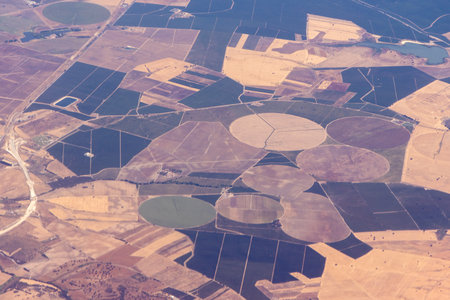 A passenger view from the skies above as an aircraft flies over.の写真素材