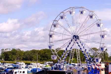 The Big Wheel is a very well known and enjoyable fair ground ride that has been around for hundreds of years.の写真素材