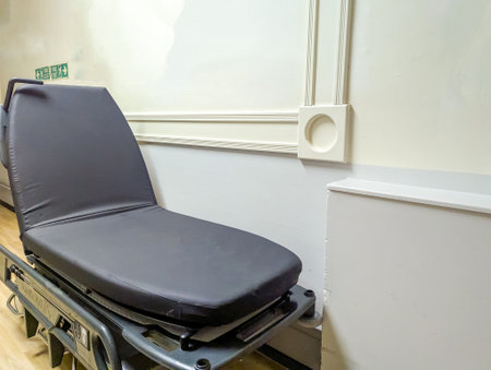 A typical hospital bed located in a corridor as there are no more ward spaces, something that is a known issue amongst all hospitals.の写真素材
