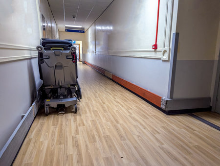 A typical hospital corridor view where patients and staff transit through day and night, fast and slow.の写真素材