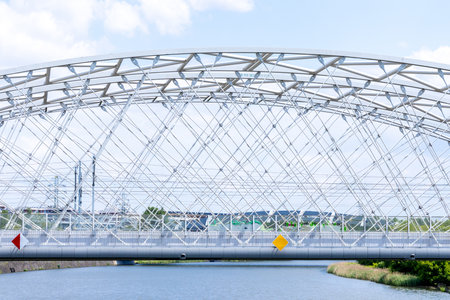 A large bridge crossing in Krakow, Poland, allowing people to get from one side of an area to another.の写真素材