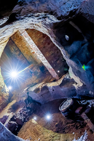 A large tunnel dug out of the rock underground to allow a route from a to b, deeper or to surface.の写真素材