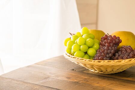 Fruit on the Window (Grapes and Pear)の写真素材