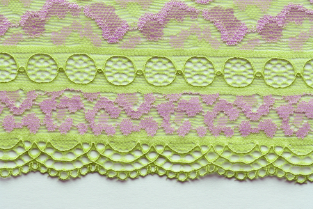 The macro shot of the green lace texture material