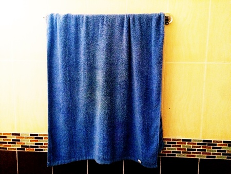 Blue cloth with bright colors. Looks strange.の写真素材
