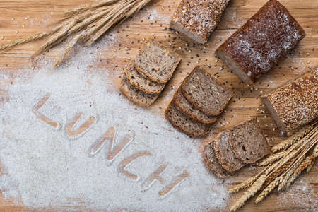 Composition consisting of homemade whole grain bread. A healthy and wholesome breakfast.