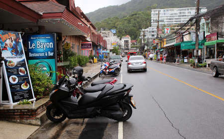 Luang Phor Chuan Road Street with numerous shops and stores and restaurants, Karon, Phuket, Thailandのeditorial素材