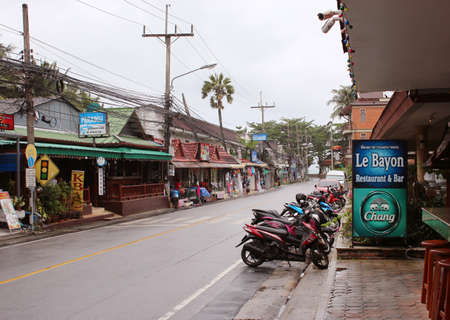 Luang Phor Chuan Road Street with numerous shops and stores and restaurants, Karon, Phuket, Thailandのeditorial素材