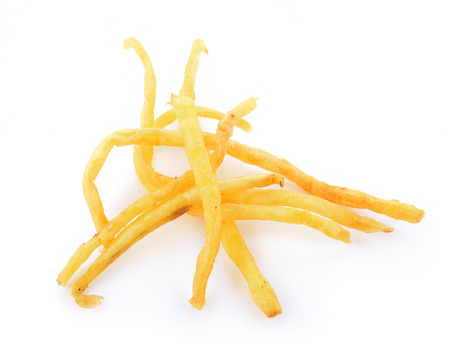 pile of appetizing french fries on a white backgroundの写真素材
