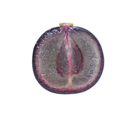 Black seedless grapes isolated on white backgroundの写真素材