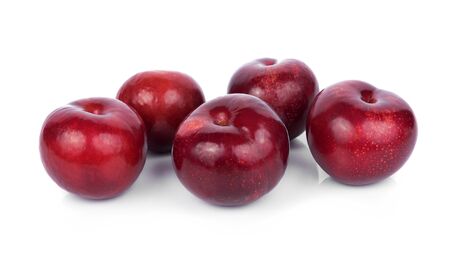 plums isolated on white backgroundの写真素材