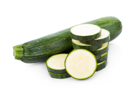 green zucchini vegetables isolated on white backgroundの写真素材
