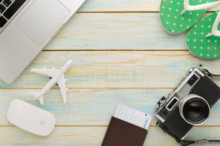 Summer holiday background, Travel and vacation items on wooden table. Top viewの写真素材
