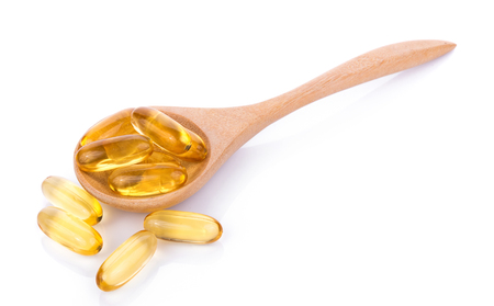 Fish oil pill on white backgroundの写真素材