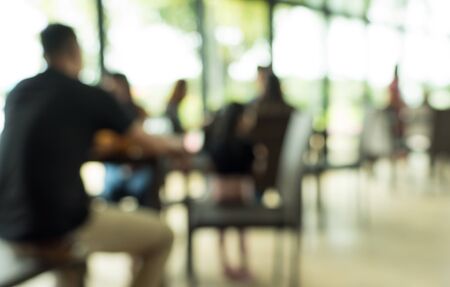Blurred background of restaurant with peopleの写真素材