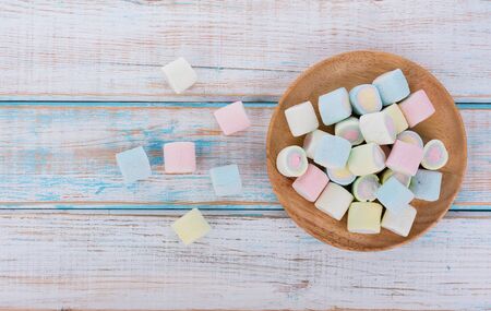 marshmallows on wooden backgroundの写真素材