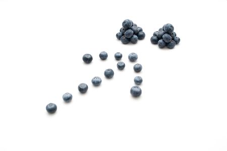 Arrow pointing two stack of blueberries