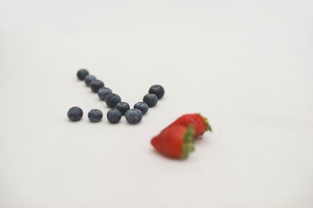Arrow pointing to strawberriesの写真素材