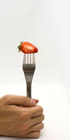 Strawberry on forkの写真素材