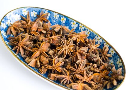 Star Anise spices in oriental bowlの写真素材