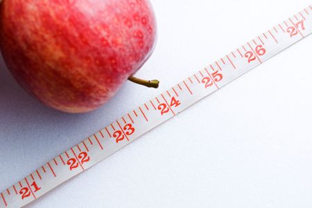 Apple with measuring tape - focus 24の写真素材