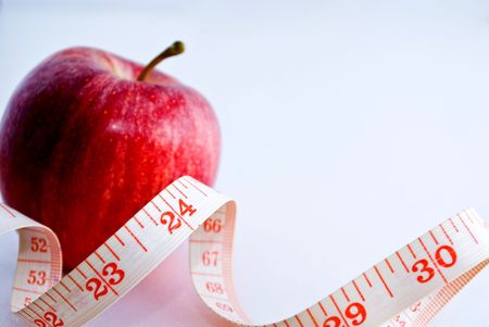 Apple with measuring tape - 24inchの写真素材