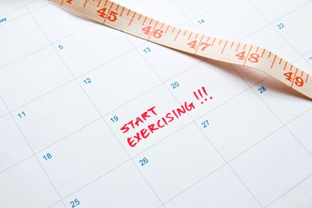 Start Exercising - note on measurement and calenderの写真素材