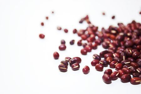 Red Azuki beans on white background