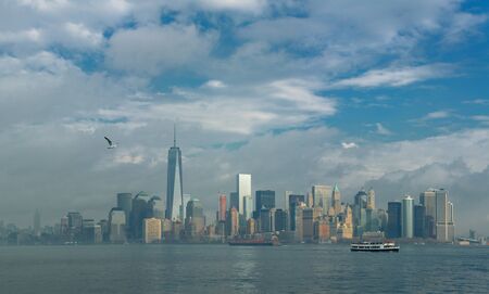 View of Manhattan from Liberty Island on a cloudy day.Photo taken on 13th November 2014のeditorial素材