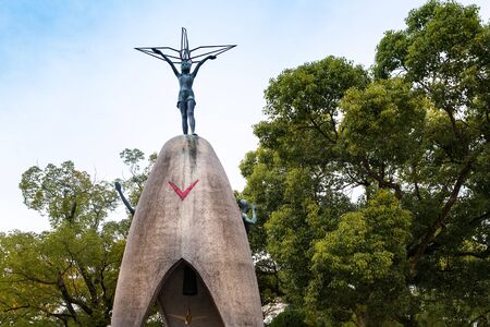 HIROSHIMA, JAPAN, NOVEMBER 21, 1015: The Children's Peace Monument, with a figure of Sadako Sasaki at the top of the statue, and a boy and a girl at the sides.のeditorial素材