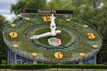Large clock. Attractions. A large clock with flowers in the center of the city Krivoy Rog, Ukraine.のeditorial素材