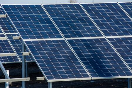 Solar panels. A series of solar panels in a huge field.